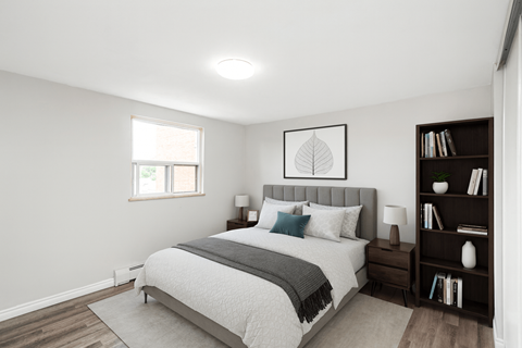A bedroom with a bed, nightstand, and bookshelf.
