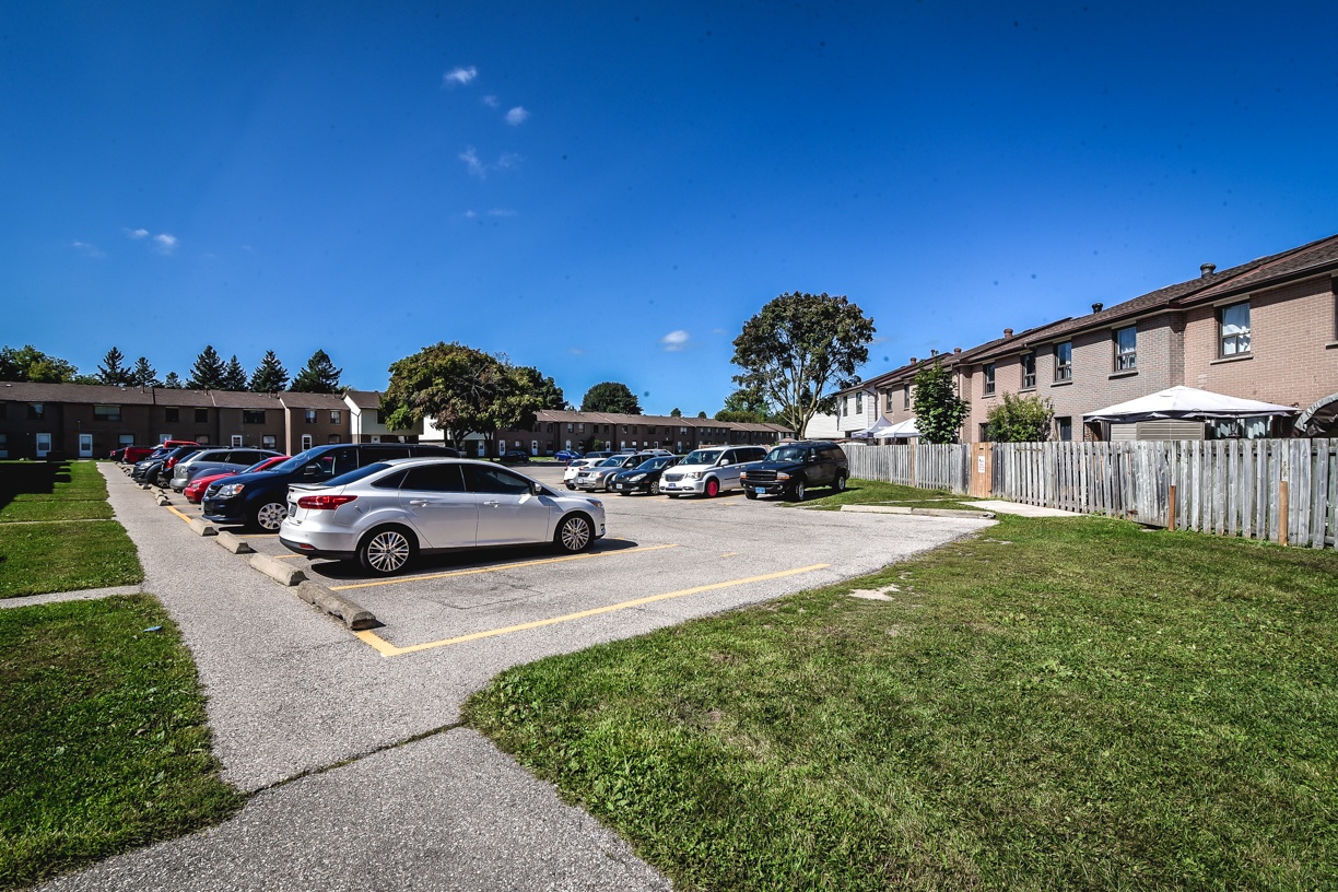 A parking lot with cars parked in it.
