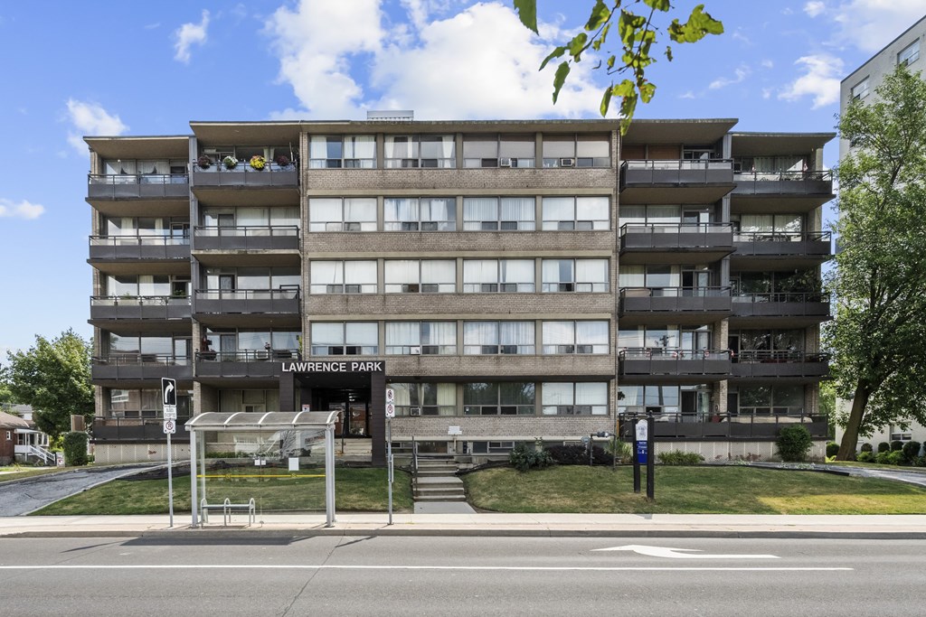 A large apartment building with the name Lawrence Park on the front.