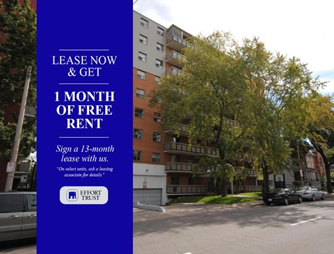 A blue sign offering a free month of rent for signing a 13-month lease.