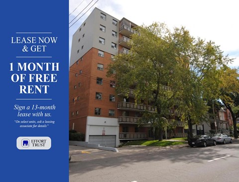 A building with a sign offering 1 month of free rent.