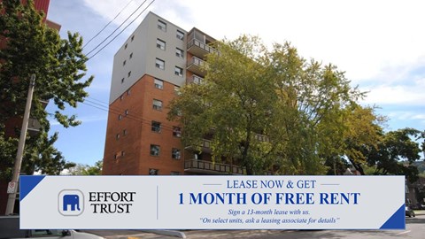 A sign for Effort Trust offering a free month of rent.