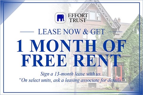 A sign advertising a free month of rent for signing a 13-month lease with Effort Trust.