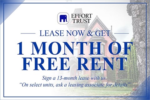 A sign advertises a 1 month free rent offer from Effort Trust.