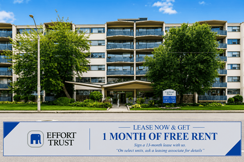 A large building with a sign in front that says "Effort Trust" and "1 month of free rent".