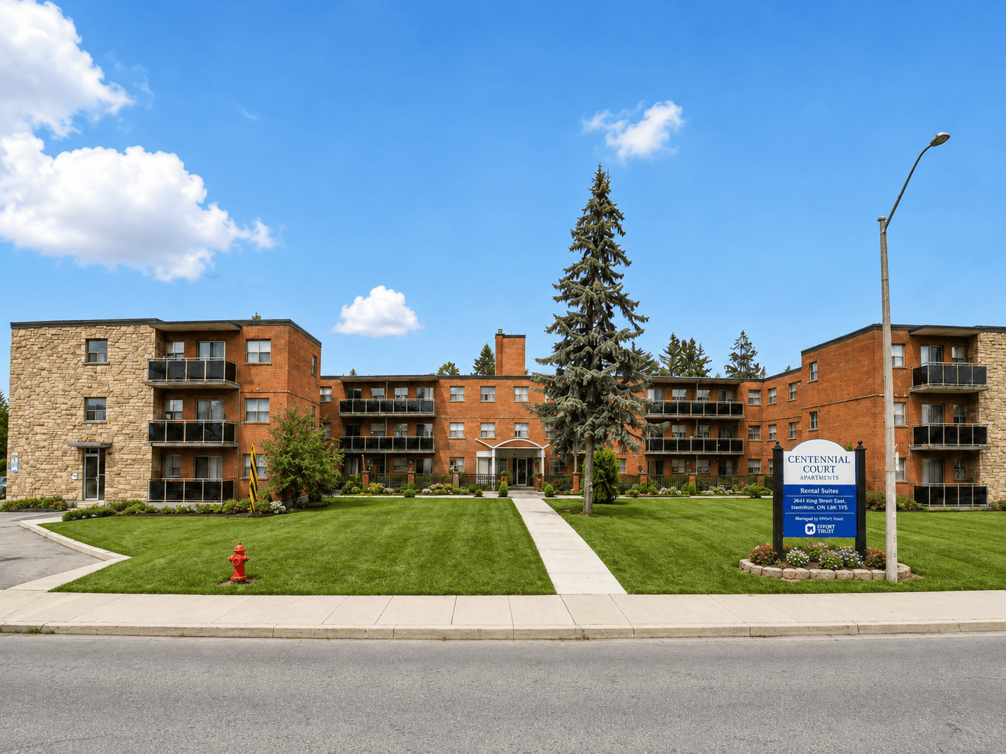 A large brick building with a sign that says