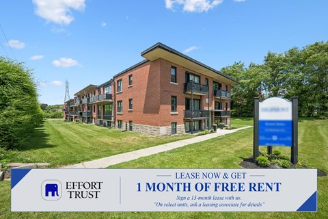 A sign advertises a free month of rent for leasing a unit at Effort Trust.