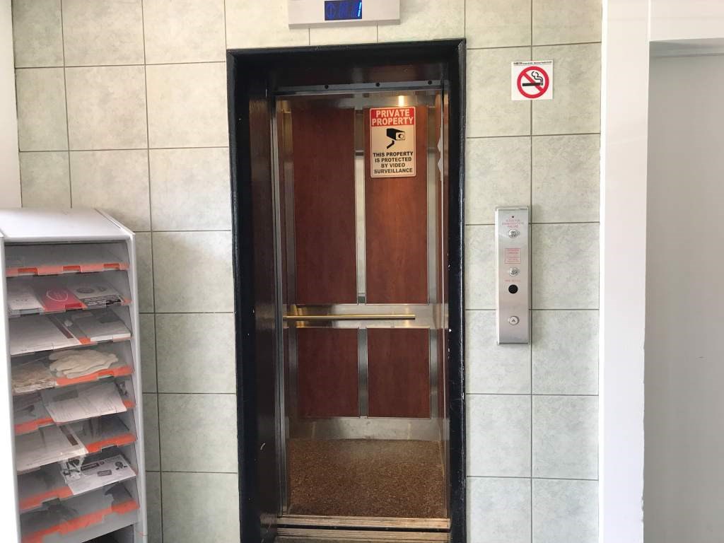 A door with a sign on it that says private.