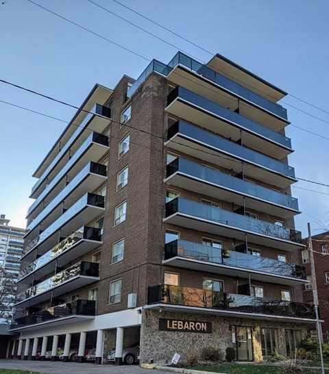 A tall building with the word "LEBARON" on the front.