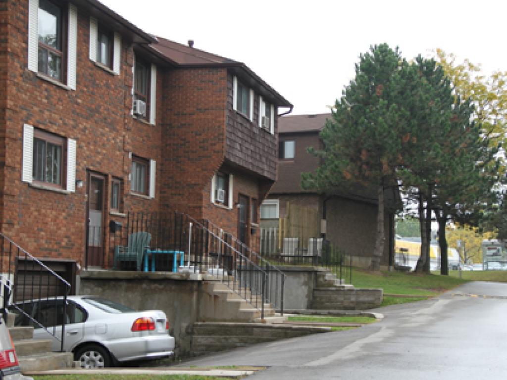A car is parked on the side of a street.