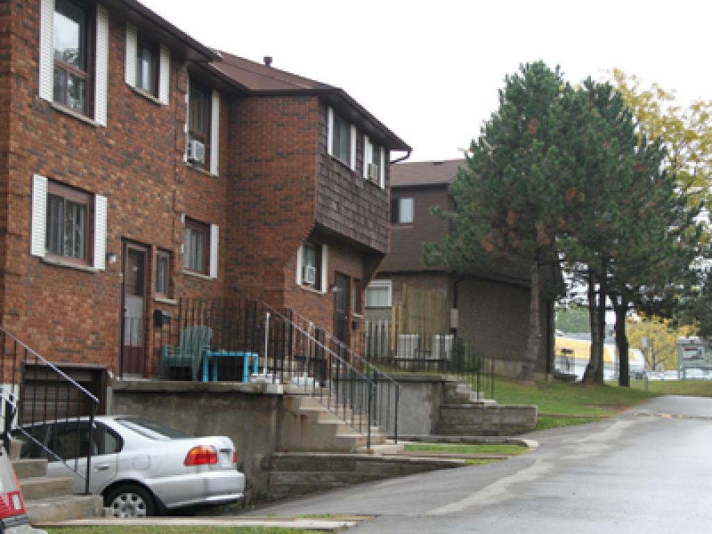 A car is parked on the side of a street.