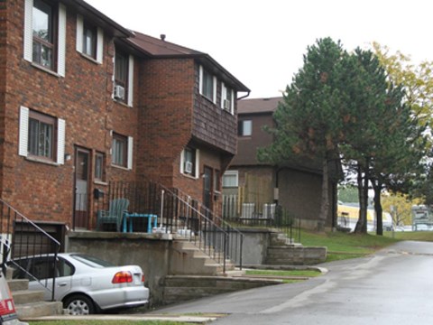 A car is parked on the side of a street.