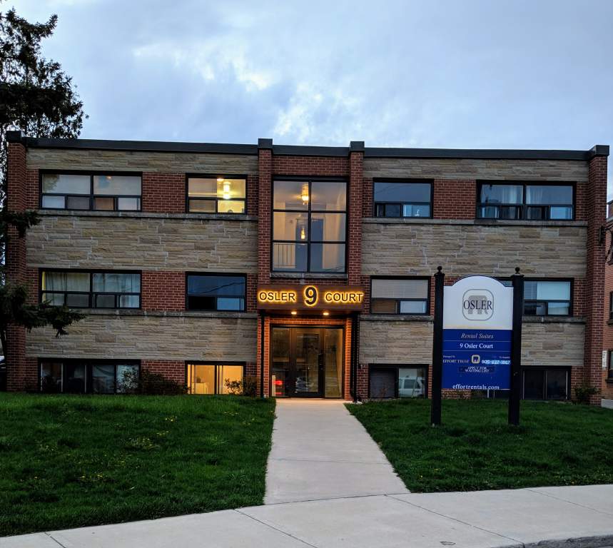 The Osler Court building is a modern structure with a brick facade and a welcoming entrance.