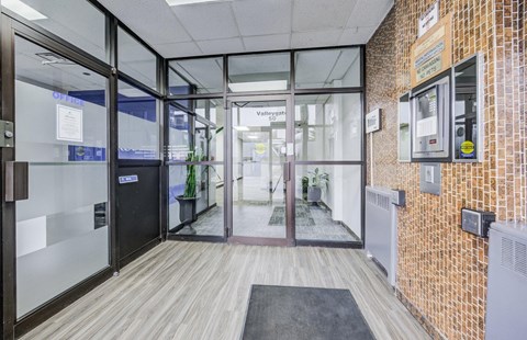 A hallway with a sign that says Valleygate on it.