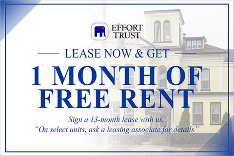 A sign advertising a 1 month free rent offer from Effort Trust.