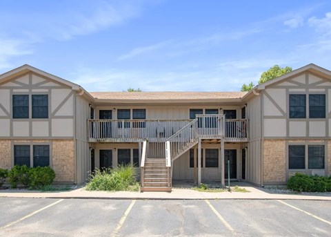 A building with a staircase leading to the entrance.