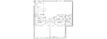 A black and white image of a floor plan for a kitchen and bathroom.