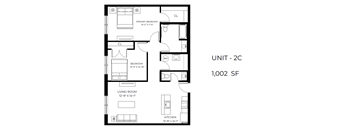A floor plan of a 1,002 square foot unit, showing a living room, kitchen, bedroom, and bathroom.