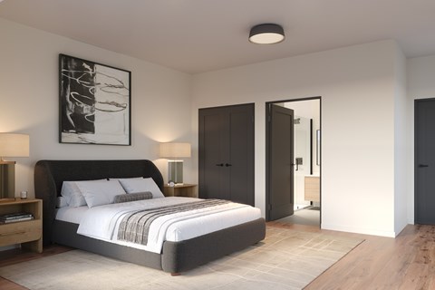 A modern bedroom with a large bed and a painting on the wall.