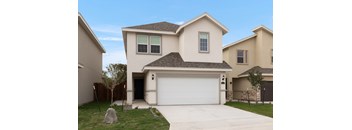 A beige house with a white garage door.