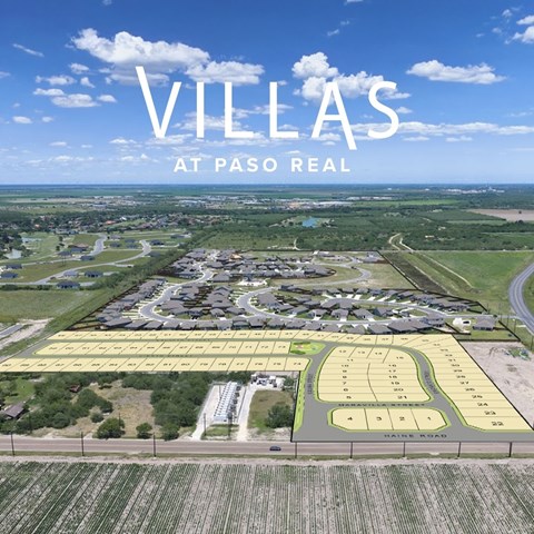 Villas at Paso Real is a residential community with multiple buildings and a large open field.