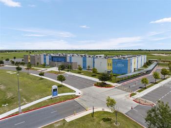 A large building complex with the word "IDEA" on it.