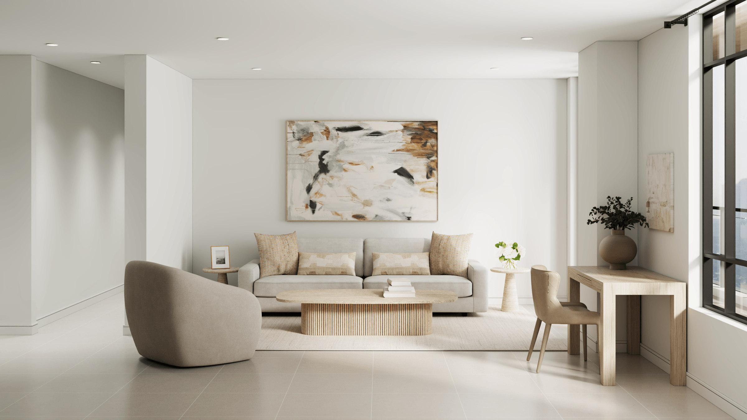 A modern living room with a large painting on the wall and a white sofa.