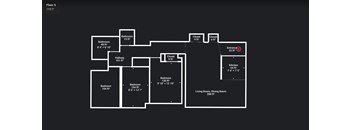 A floor plan of a house with a living room, dining room, and two bedrooms.