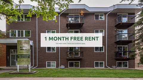 Apartment complex with a sign offering a 1 month free rent.