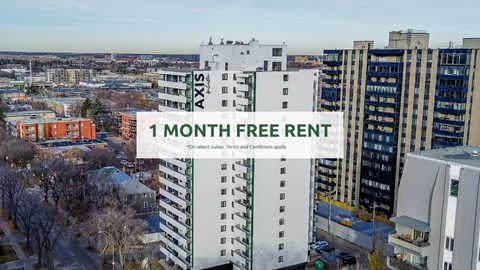 A cityscape with a building offering a 1 month free rent.