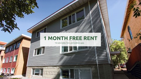 A building with a sign that says "1 MONTH FREE RENT".