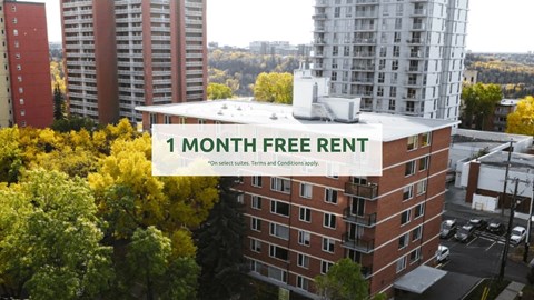 A building with a sign offering a 1 month free rent.