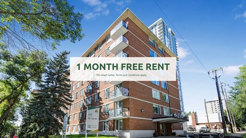 A modern apartment building offers a 1 month free rent deal.