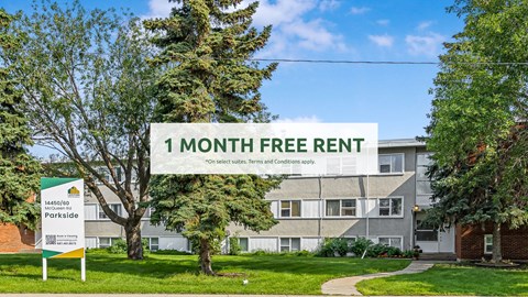 A sign offering a 1 month free rent on select terms and conditions apply.