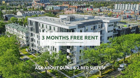 An aerial view of a building with a sign offering 3 months free rent.