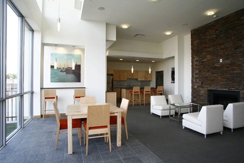 A dining room with a table and chairs.at 66 Main, Yonkers, NY