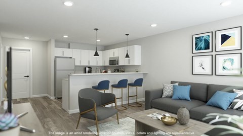 A modern living room with a grey sofa and a bar area.