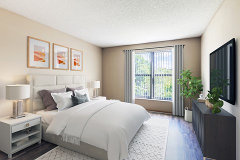 A bedroom with a large bed, a nightstand with a lamp, and a flat-screen TV mounted on the wall.