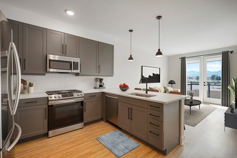 A modern kitchen with wooden cabinets and stainless steel appliances.
