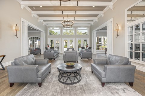 A living room with grey couches and a coffee table.