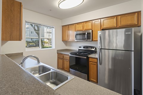 A Kitchen at Valley Springs Apartments in Renton, WA