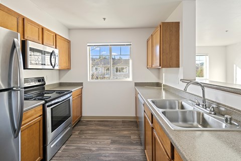 A Kitchen at Valley Springs Apartments in Renton, WA