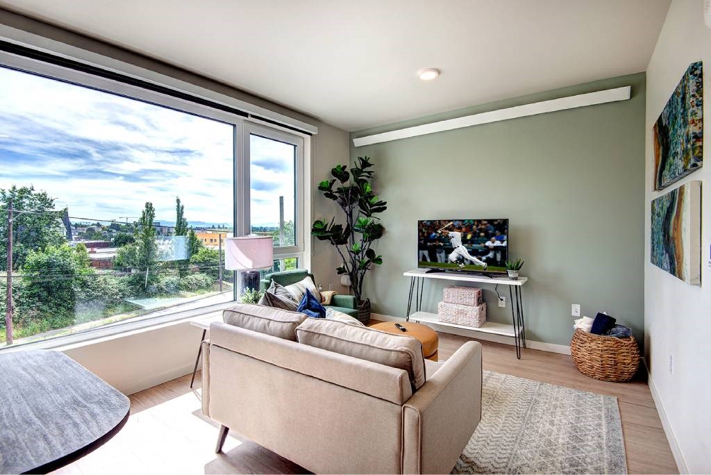 Living Area With TV at Metro Line Flats, Seattle, WA, 98122