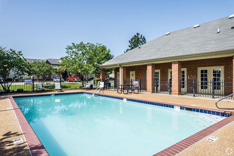 A pool with a red and tan border.