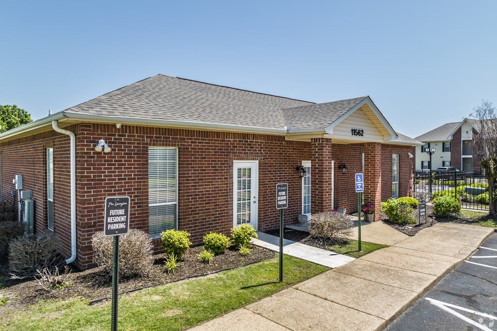 A brick building with a Future Academies sign on the front.