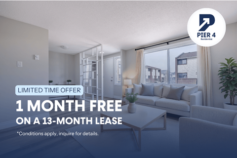 A living room with a 1 month free offer on a 13-month lease.