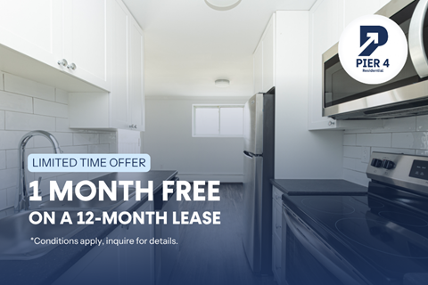 A kitchen with a sign offering a free month on a 12-month lease.