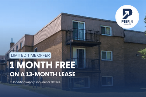 A building with a sign offering a free month on a 13-month lease.