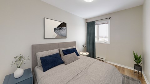 A bedroom with a bed, nightstand, and a painting on the wall.