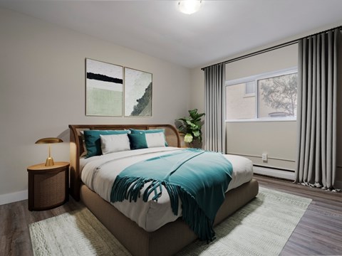 A bedroom with a large bed and a lamp on a side table.